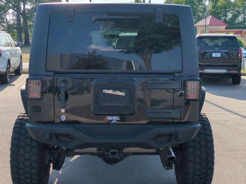 Black Clearcoat 2012 Jeep Wrangler Unlimited Sahara