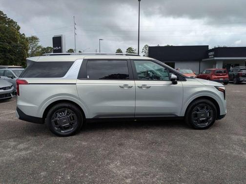 Ivory Silver 2026 Kia Carnival Hybrid EX