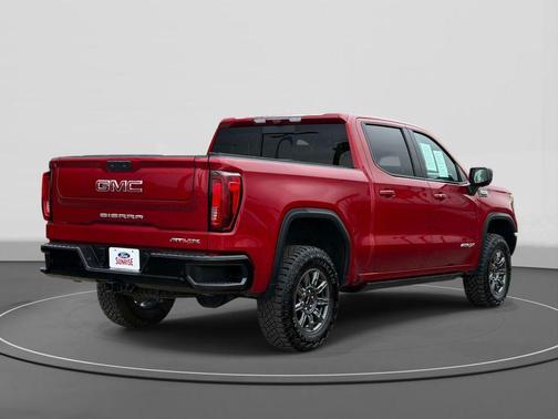 Volcanic Red Tintcoat 2024 GMC Sierra 1500 AT4X