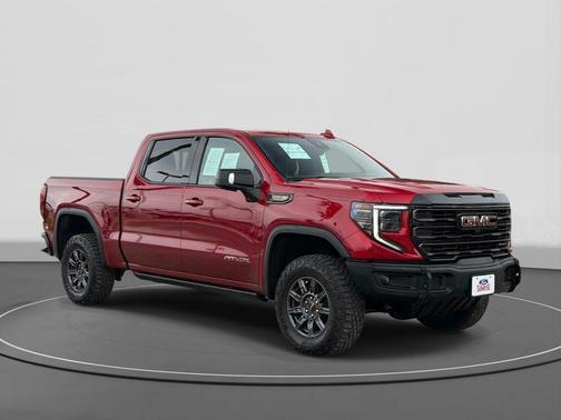 Volcanic Red Tintcoat 2024 GMC Sierra 1500 AT4X