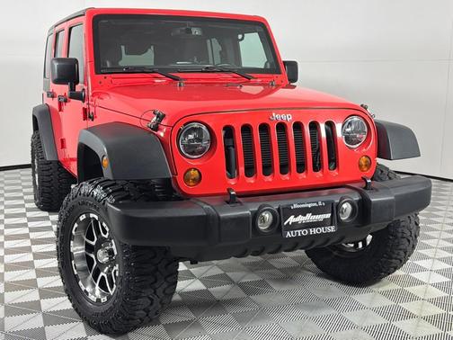 Red 2013 Jeep Wrangler Unlimited Sport