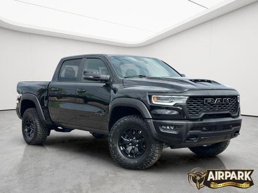 Diamond Black Crystal Pearlcoat 2026 RAM 1500 RHO Crew Cab 4x4 5'7' Box