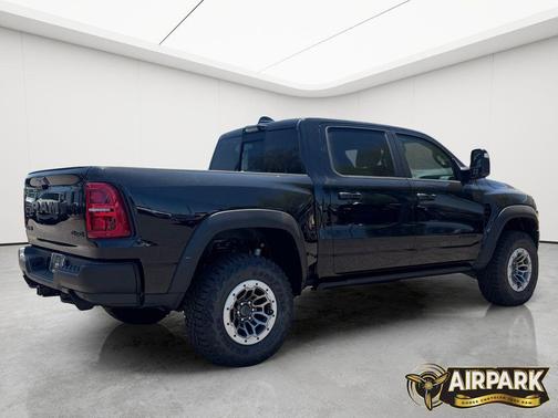 Diamond Black Crystal Pearlcoat 2026 RAM 1500 RHO Crew Cab 4x4 5'7' Box
