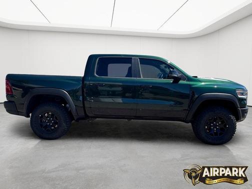 Serrano Green Metallic 2026 RAM 1500 RHO Crew Cab 4x4 5'7' Box
