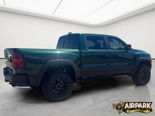 Serrano Green Metallic 2026 RAM 1500 RHO Crew Cab 4x4 5'7' Box
