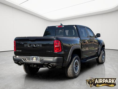 Diamond Black Crystal Pearlcoat 2026 RAM 1500 RHO Crew Cab 4x4 5'7' Box