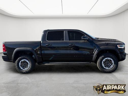 Diamond Black Crystal Pearlcoat 2026 RAM 1500 RHO Crew Cab 4x4 5'7' Box