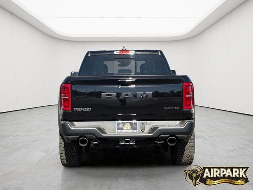 Diamond Black Crystal Pearlcoat 2026 RAM 1500 RHO Crew Cab 4x4 5'7' Box