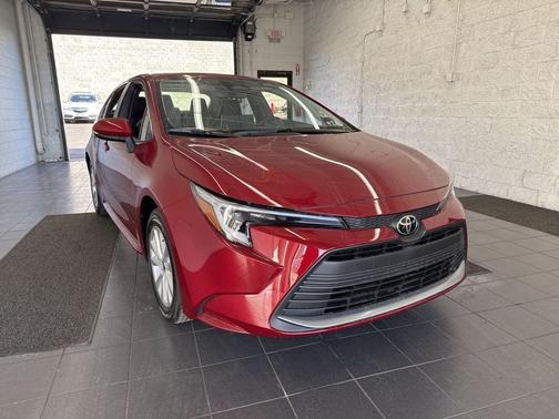 Ruby Flare Pearl 2026 Toyota Corolla Hybrid XLE