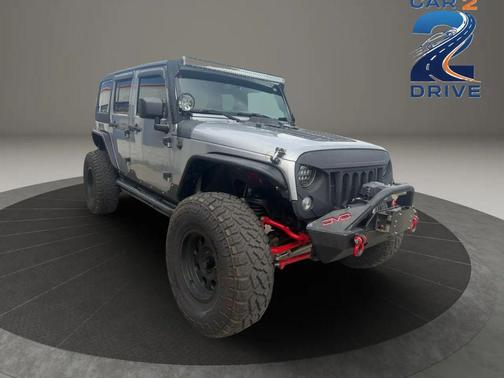 Gray 2014 Jeep Wrangler Unlimited Sahara