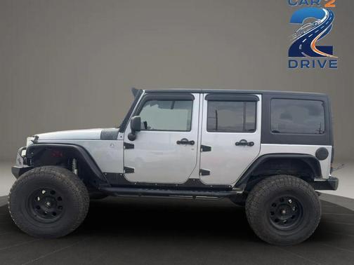 Gray 2014 Jeep Wrangler Unlimited Sahara