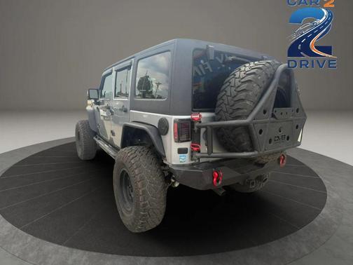 Gray 2014 Jeep Wrangler Unlimited Sahara