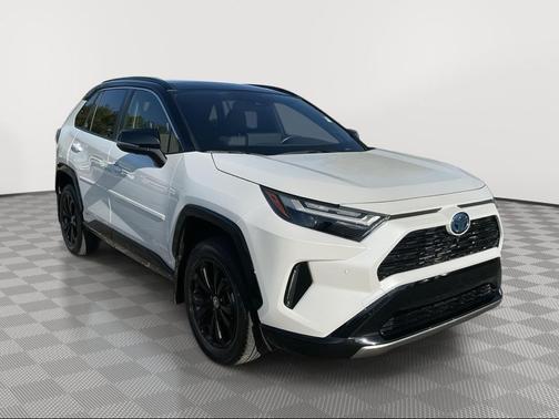 Wind Chill Pearl/Midnight Black Metallic 2023 Toyota RAV4 Hybrid SE