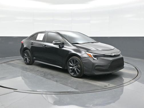 Midnight Black Metallic 2023 Toyota Corolla Hybrid SE Infrared