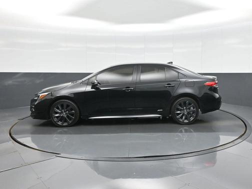 Midnight Black Metallic 2023 Toyota Corolla Hybrid SE Infrared