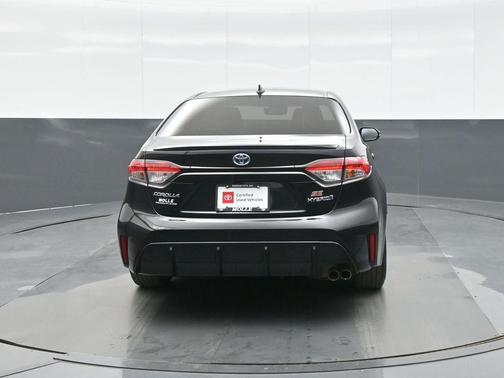 Midnight Black Metallic 2023 Toyota Corolla Hybrid SE Infrared