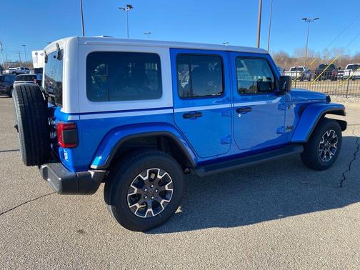 Light Blue 2026 Jeep Wrangler 4-Door Sahara 4x4