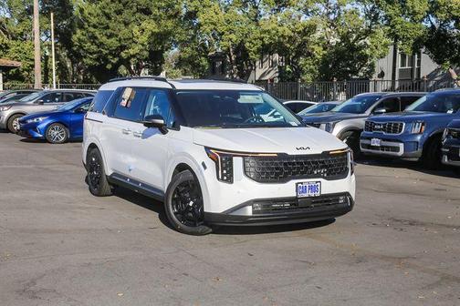 Snow White Pearl 2026 Kia Carnival Hybrid SX Prestige