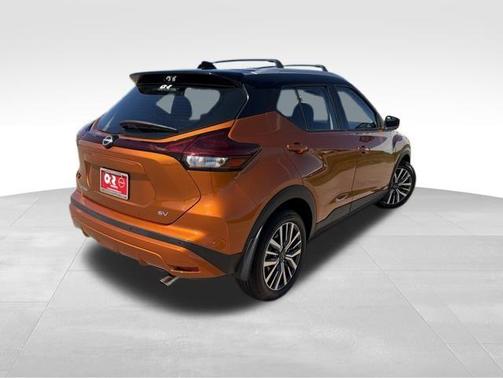 Monarch Orange / Super Black 2024 Nissan Kicks SV