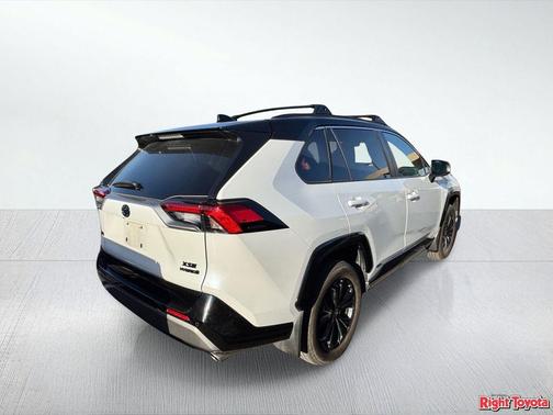 Wind Chill Pearl/Midnight Black Metallic 2024 Toyota RAV4 Hybrid SE