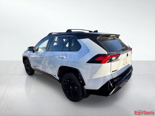 Wind Chill Pearl/Midnight Black Metallic 2024 Toyota RAV4 Hybrid SE