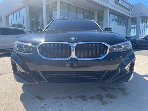Black 2024 BMW 330 i xDrive
