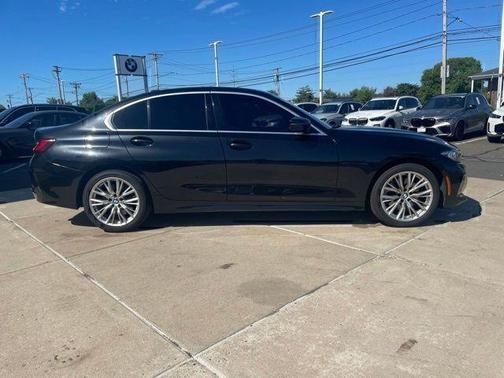 Black 2024 BMW 330 i xDrive