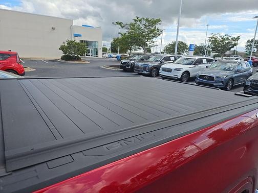 Volcanic Red Tintcoat 2025 GMC Sierra 1500 SLT