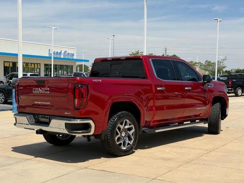 Volcanic Red Tintcoat 2025 GMC Sierra 1500 SLT
