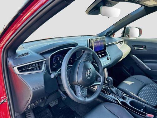 Barcelona Red Metallic/Jet Black 2024 Toyota Corolla Cross Hybrid XSE