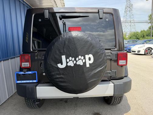 Brown 2013 Jeep Wrangler Unlimited Sahara