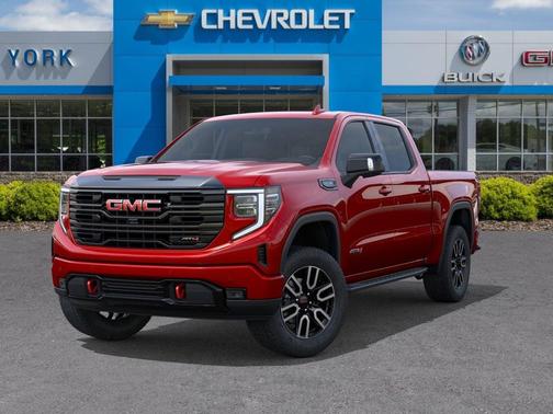 Volcanic Red Tintcoat 2026 GMC Sierra 1500 AT4