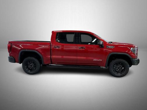 Volcanic Red Tintcoat 2024 GMC Sierra 1500 AT4X