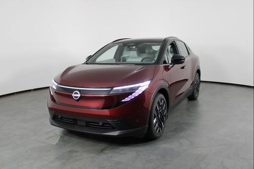 Coulis Red Metallic/Black 2026 Nissan Leaf PLATINUM+