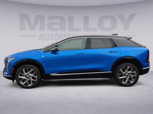 Coastal Blue Metallic 2025 Cadillac OPTIQ Luxury 1 AWD