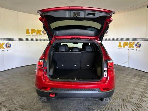 Red 2026 Jeep Compass Trailhawk