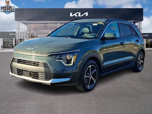 Cityscape Green 2024 Kia Niro Plug-In Hybrid EX