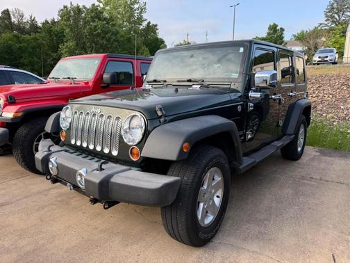Natural Green Pearl 2010 Jeep Wrangler Unlimited Sport