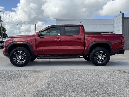 Volcanic Red Tintcoat 2024 GMC Canyon AT4