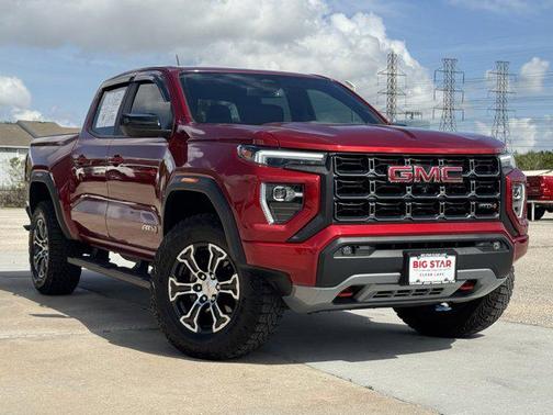 Volcanic Red Tintcoat 2024 GMC Canyon AT4