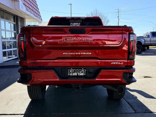 Volcanic Red Tintcoat 2024 GMC Sierra 2500 AT4
