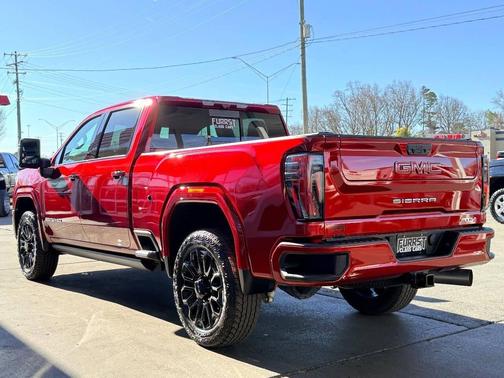 Volcanic Red Tintcoat 2024 GMC Sierra 2500 AT4