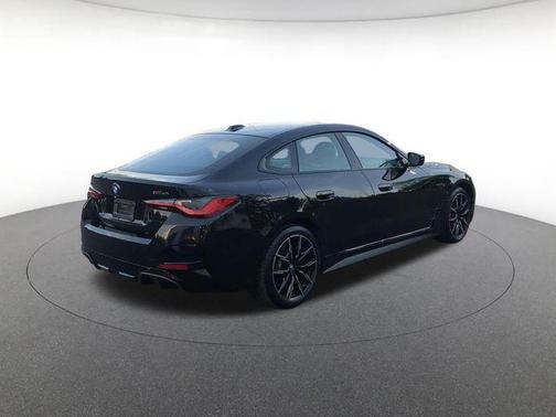 Black Sapphire Metallic 2024 BMW i4 Gran Coupe M50