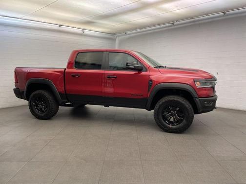 Molten Red 2026 RAM 1500 RHO Crew Cab 4x4 5'7' Box