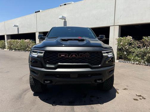Diamond Black Crystal Pearlcoat 2026 RAM 1500 RHO Crew Cab 4x4 5'7' Box