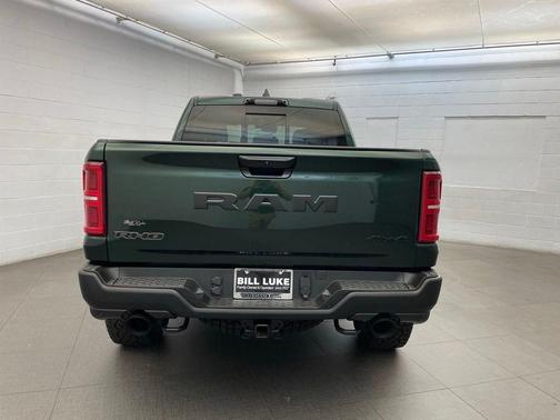 Serrano Green Metallic 2026 RAM 1500 RHO Crew Cab 4x4 5'7' Box