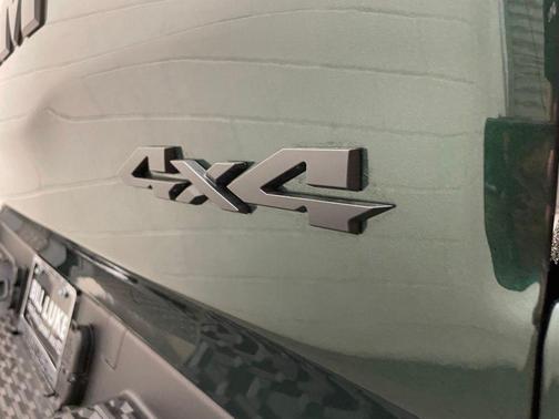 Serrano Green Metallic 2026 RAM 1500 RHO Crew Cab 4x4 5'7' Box