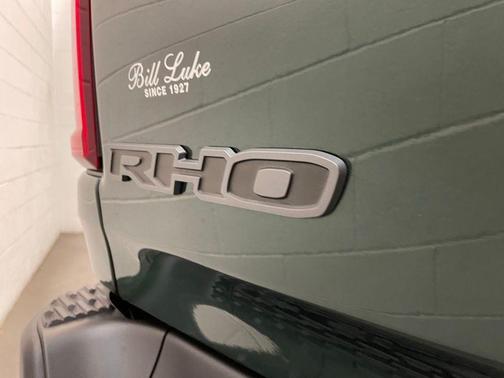 Serrano Green Metallic 2026 RAM 1500 RHO Crew Cab 4x4 5'7' Box