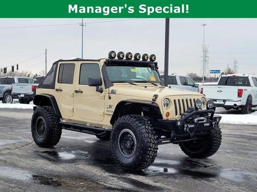 Sahara Tan Clearcoat 2011 Jeep Wrangler Unlimited Sport