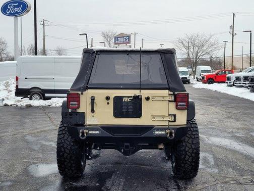 Sahara Tan Clearcoat 2011 Jeep Wrangler Unlimited Sport